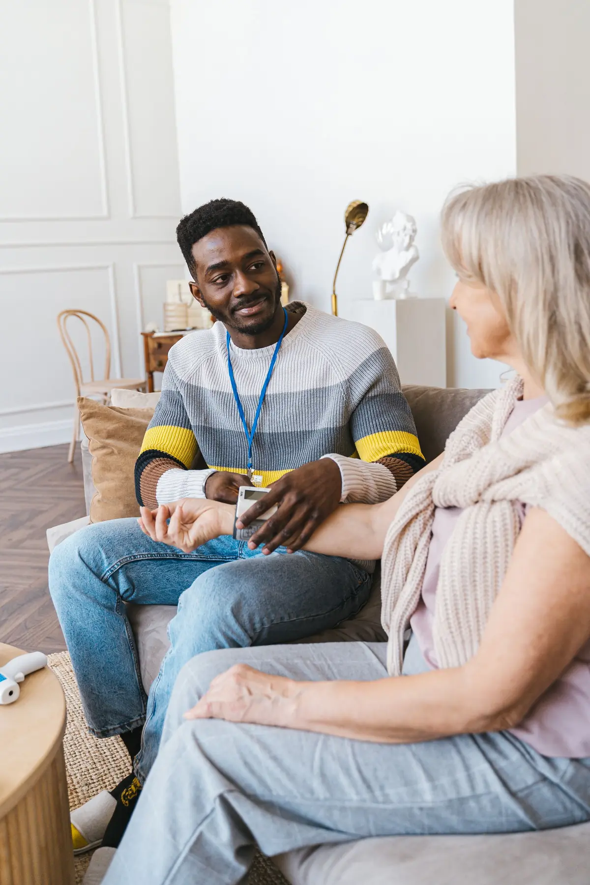 Caregiver sharing a warm moment with a client at home